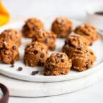 healthy cookie dough bites served on white plate