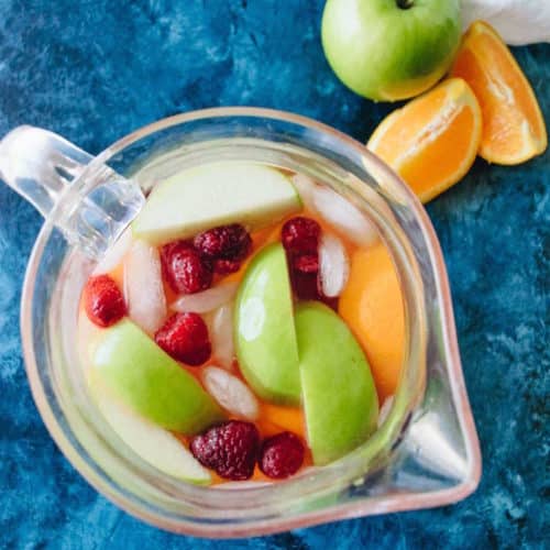 A cocktail with gut health benefits? Uh, yes please! This Kombucha Sangria is so delicious, you'll never know you're actually drinking to your health!