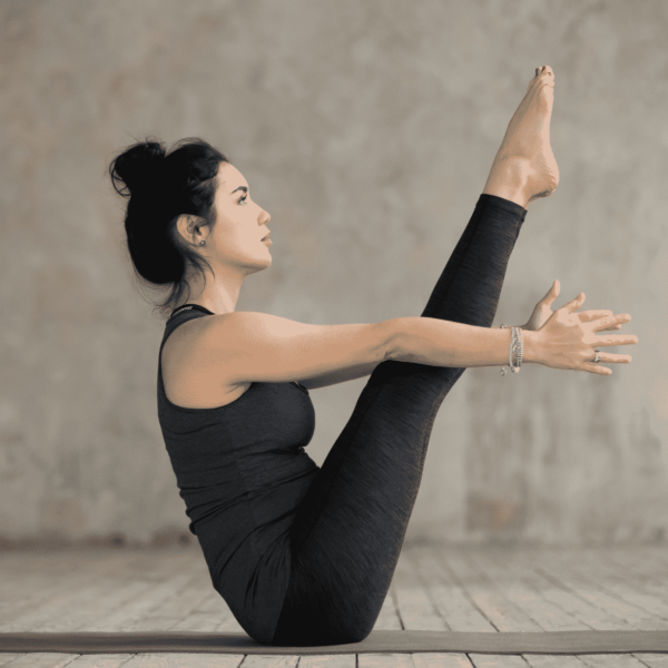 slim woman doing Pilates Exercises