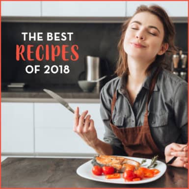 Woman enjoying her dinner with text "The Best Recipes of 2018"