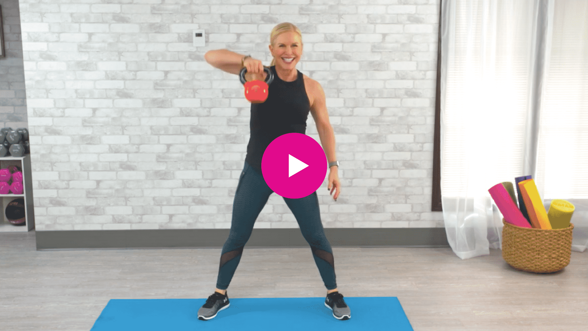Chris Freytag performing a 10 minute kettlebell workout video