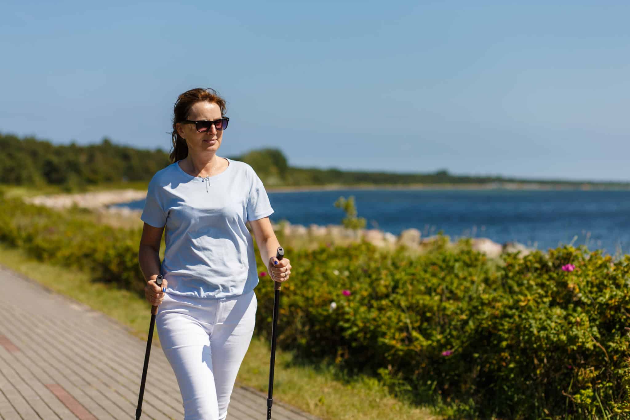 Woman walking outdoors getting exercise