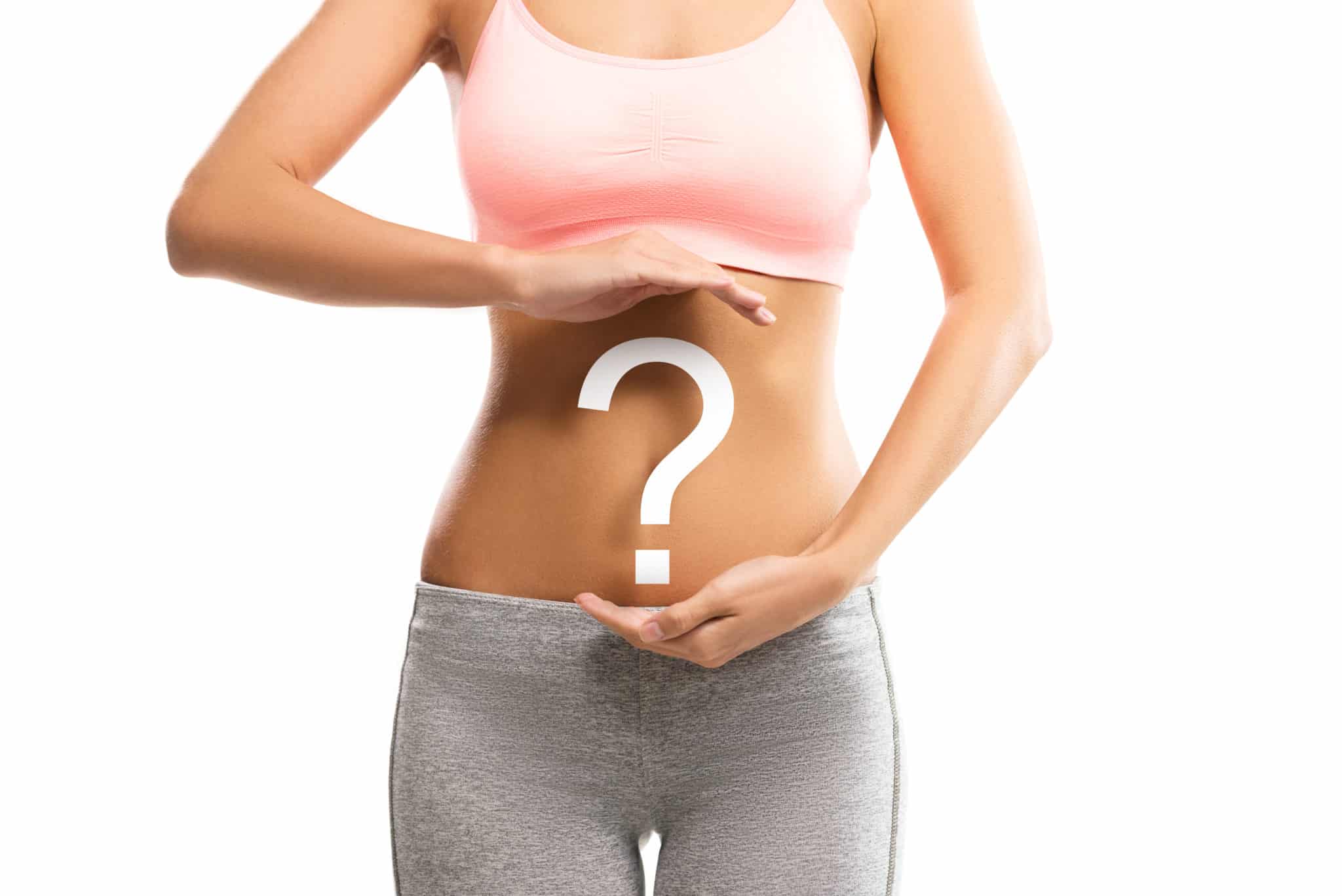 Woman with a question mark on her stomach wondering how to debloat fast