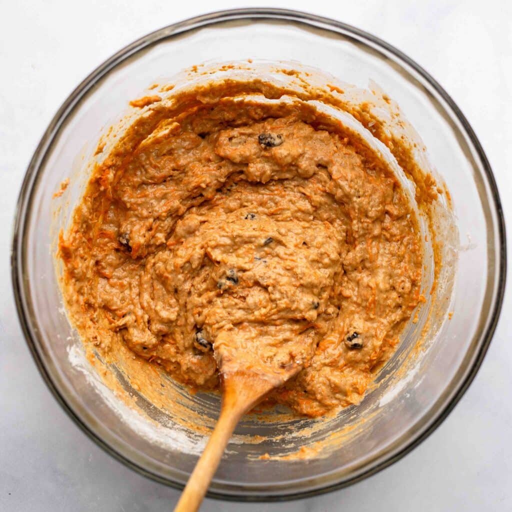 healthy carrot cake muffin batter in bowl