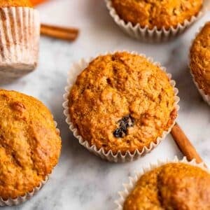 healthy carrot cake muffins on counter