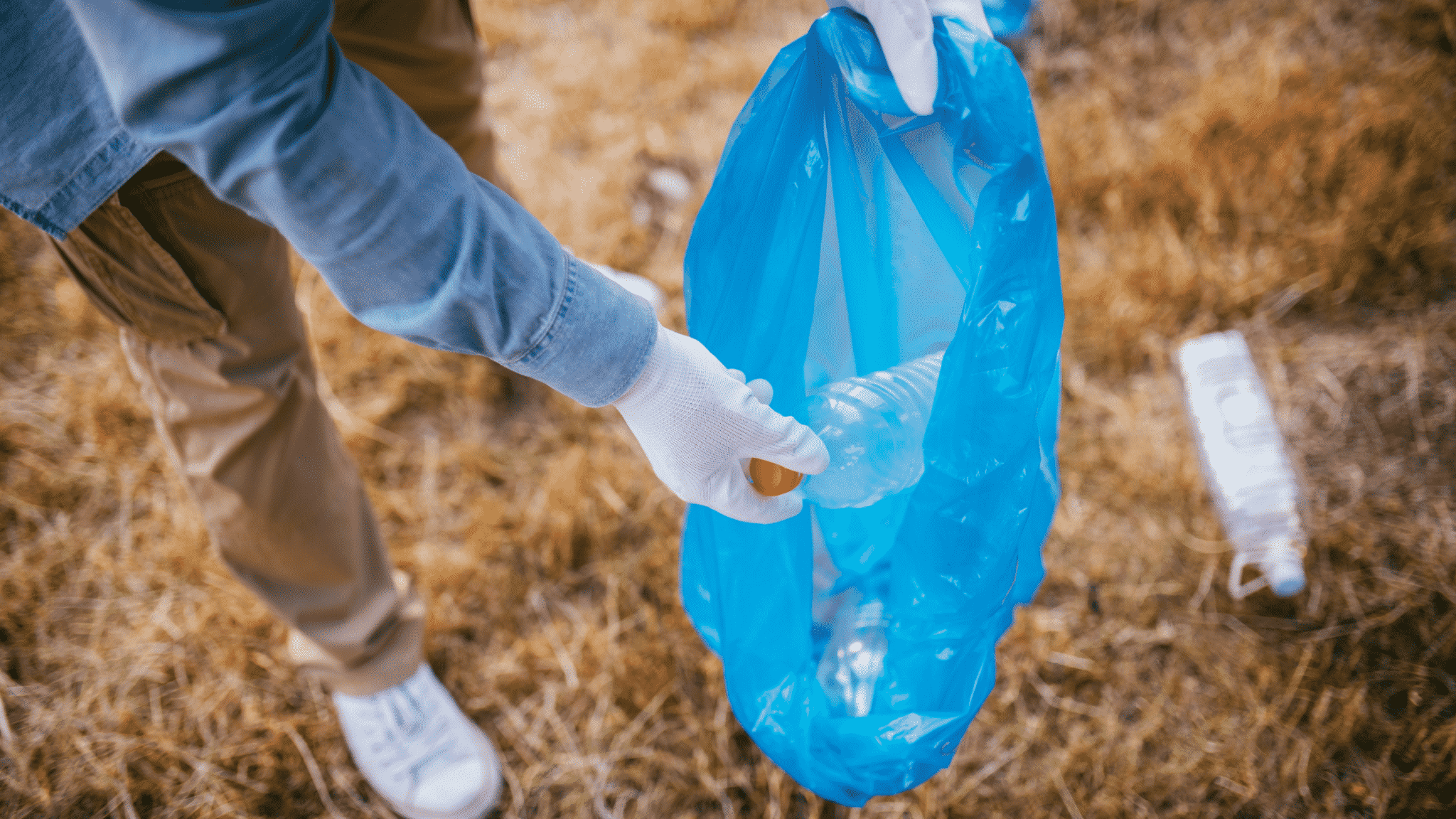 blue bag and plastic water bottle