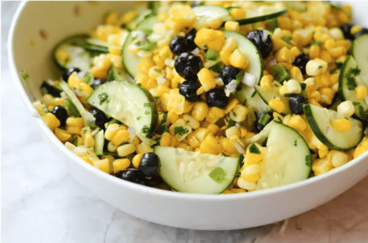 corn and blueberries in white bowl