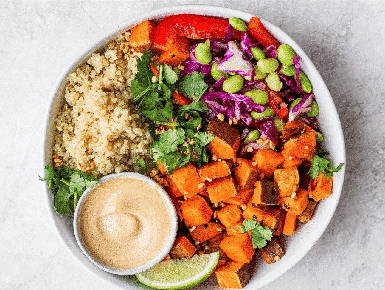 white bowl of quinoa and sweet potato 