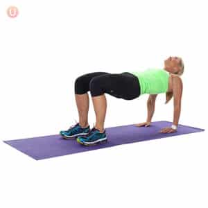 Woman doing reverse table top position