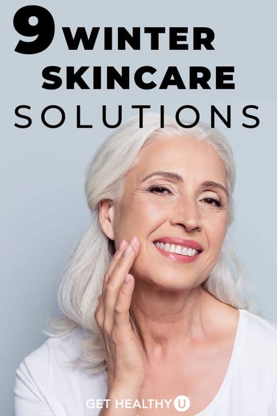 A middle aged woman touching her face with text "9 winter skin care solutions