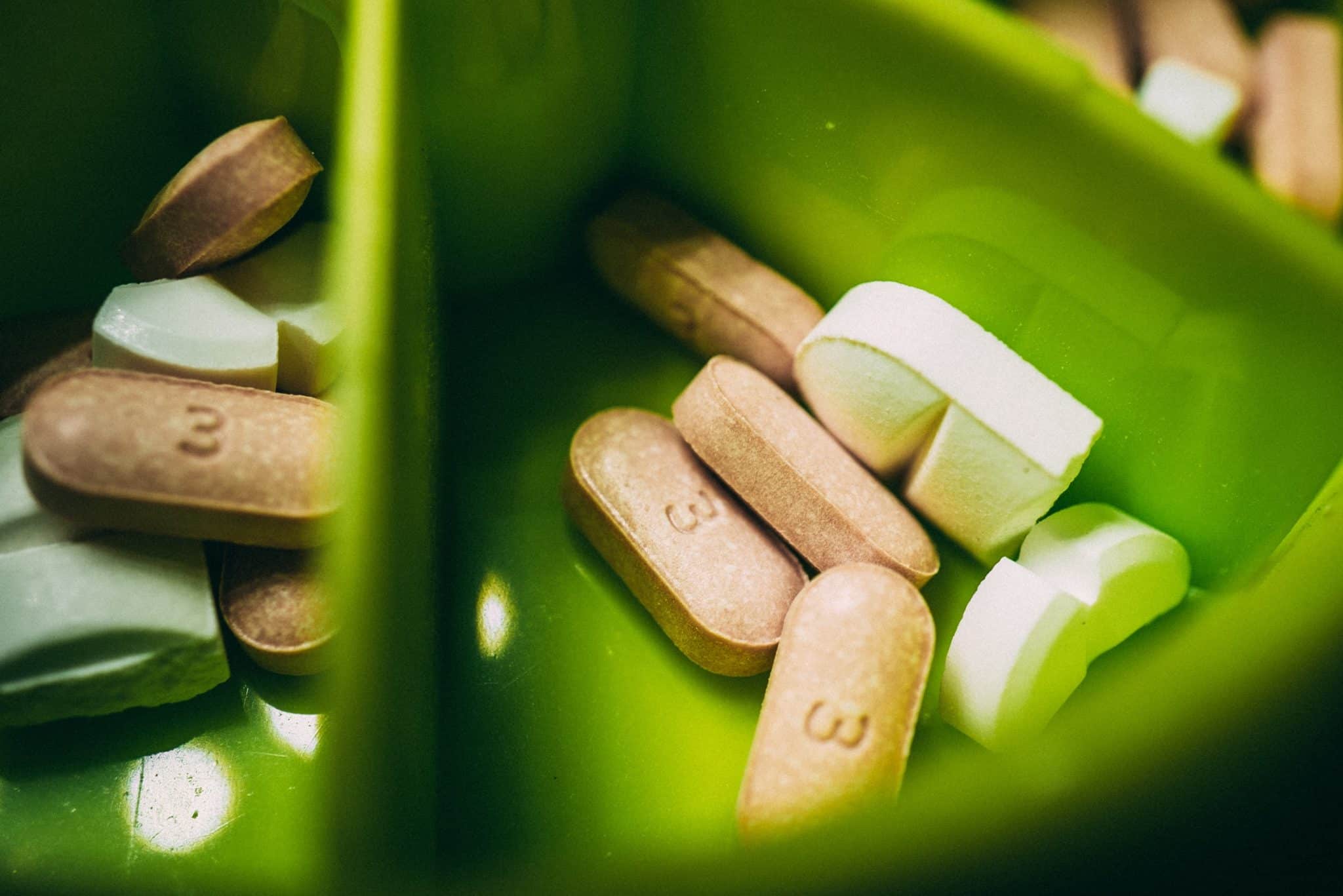 photo of supplements in green dish