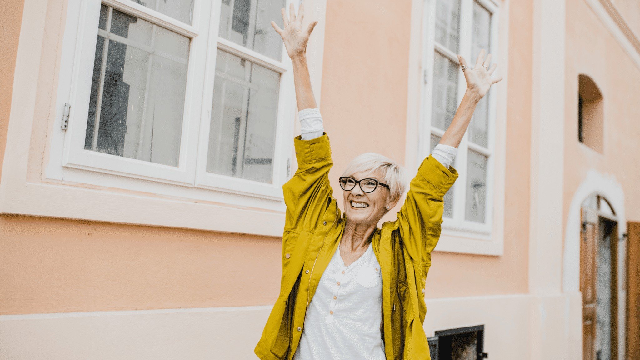 older woman happy in the street