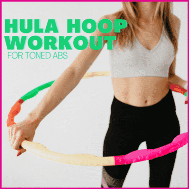 woman in workout clothing holding a colorful hula hoop