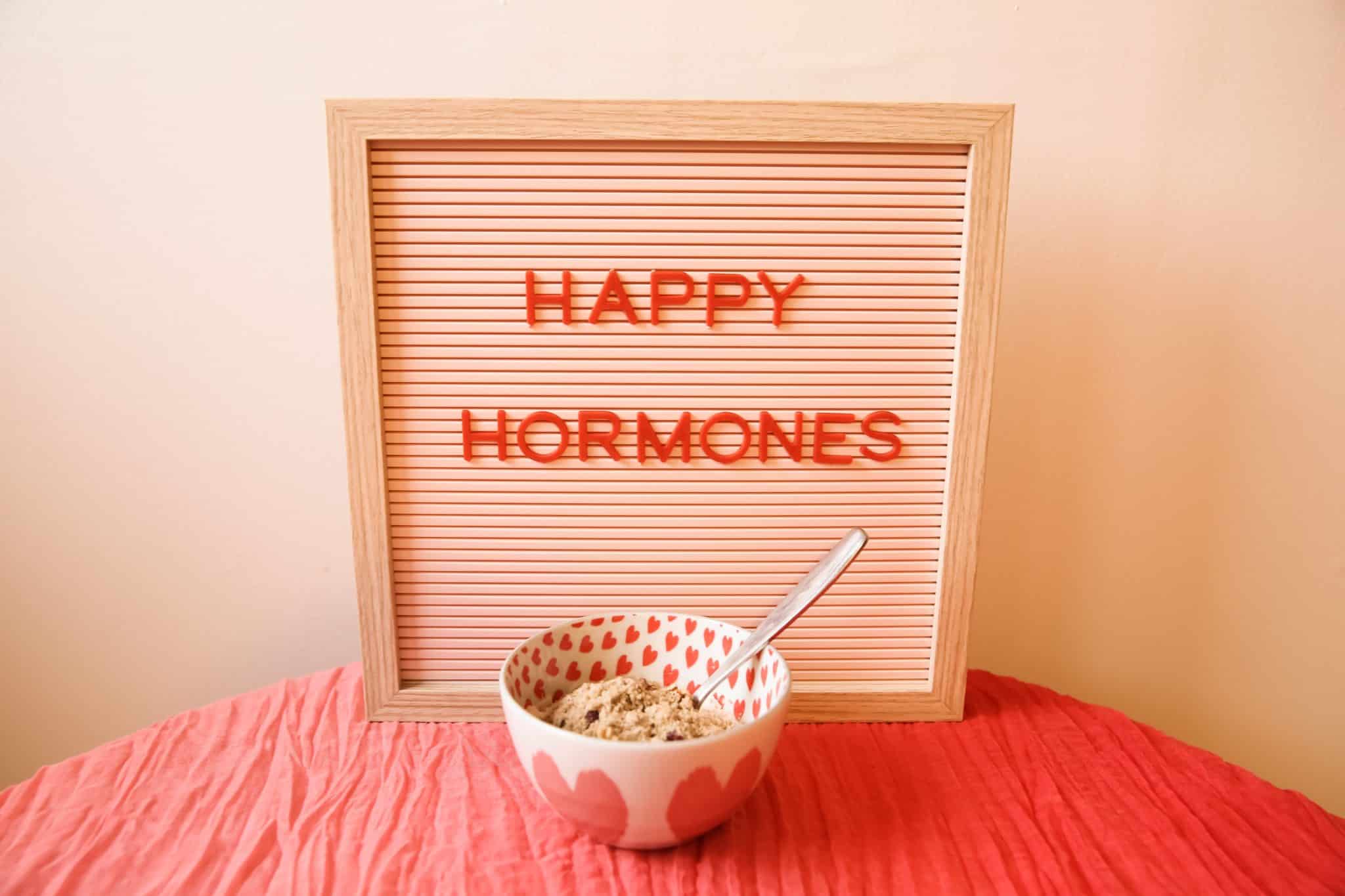picture that says happy hormones with bowl in front of it