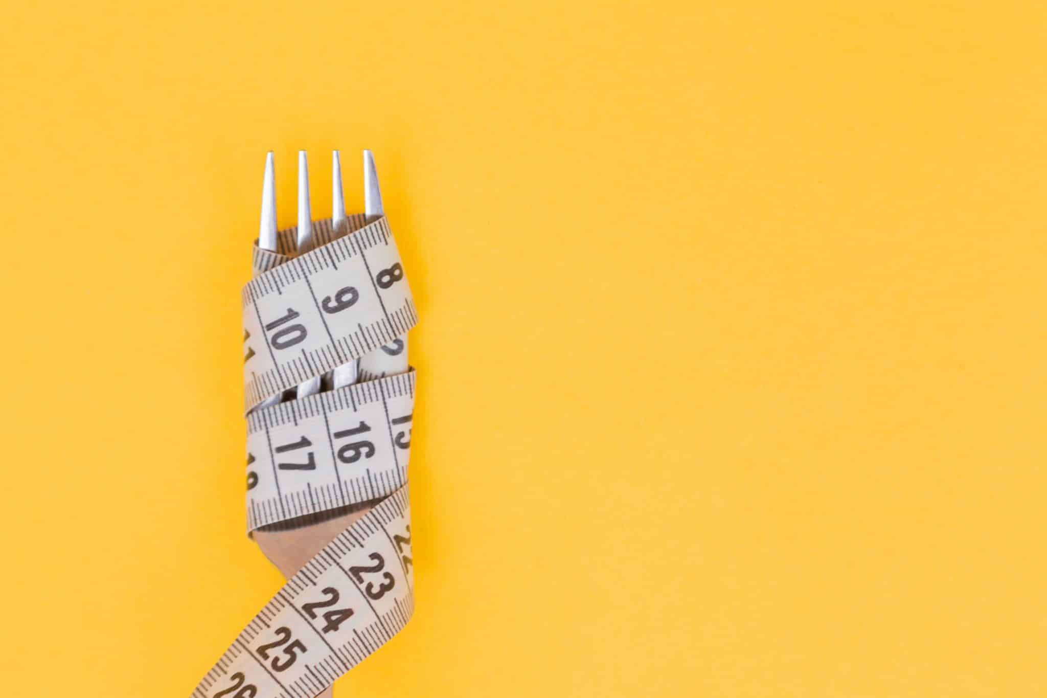 fork with measuring tape