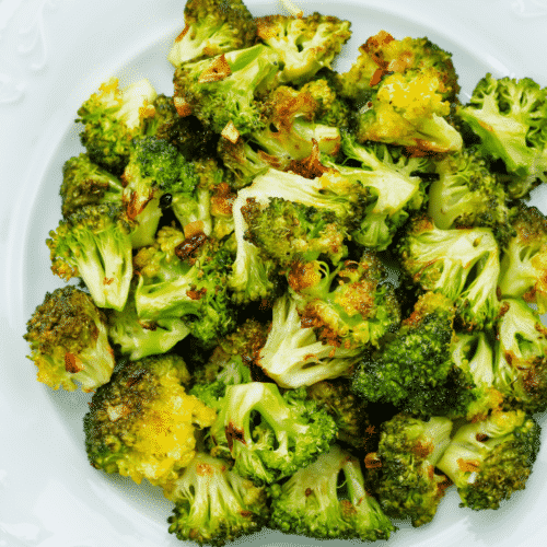 Air fryer broccoli on a white plate