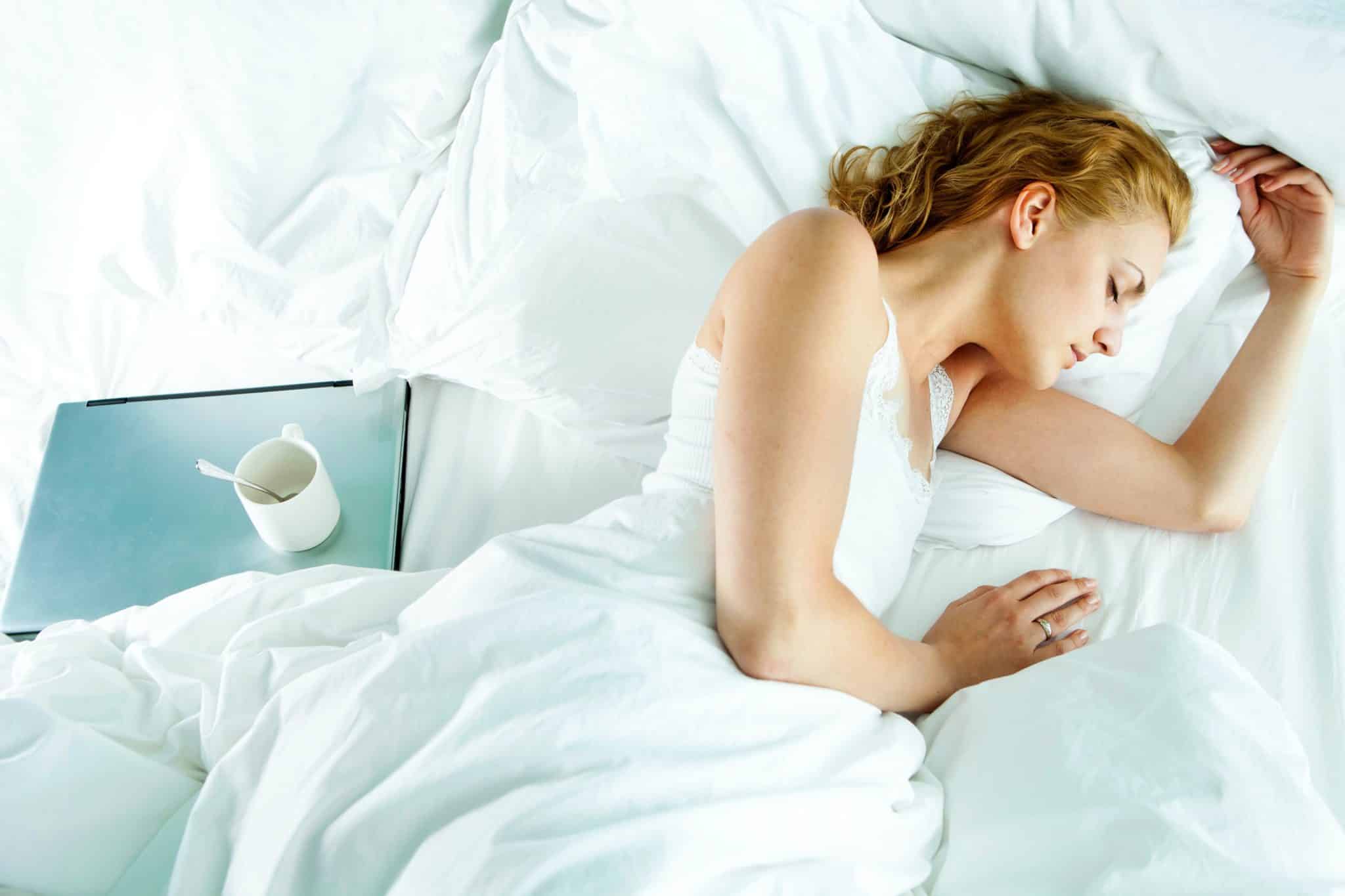 image of woman sleeping in bed
