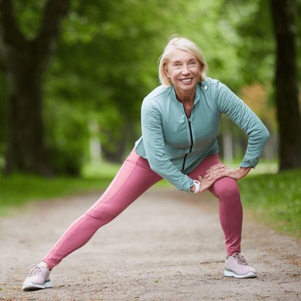 woman stretching her joints outside