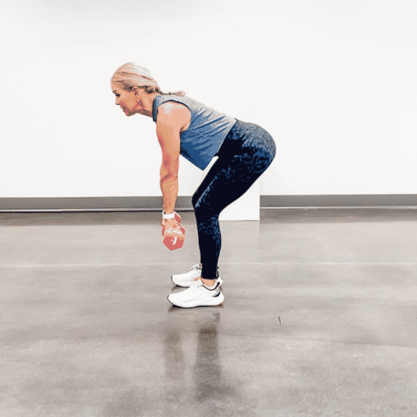 Chris Freytag performing a weighted deadlift.