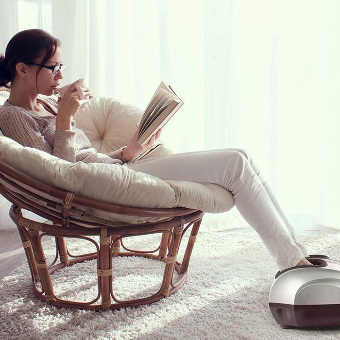 Belmint foot massager image of woman in a chair with an electric foot massager