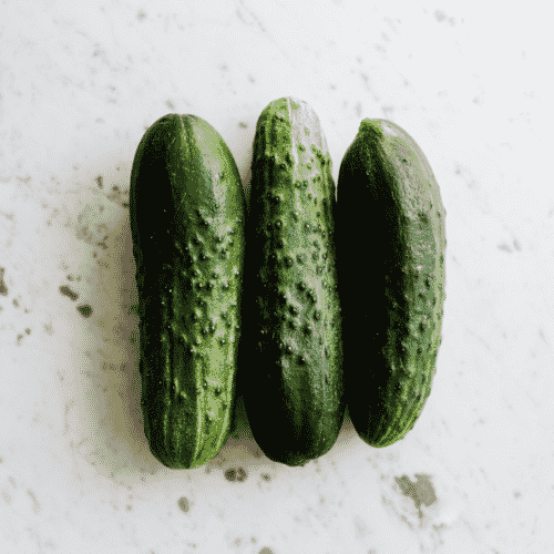 3 cucumbers on table top