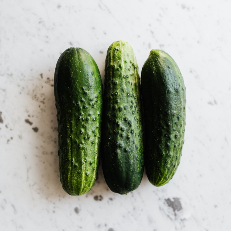 3 cucumbers on table top