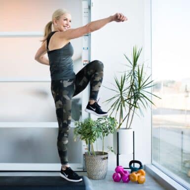 woman doing quick low impact workout at home