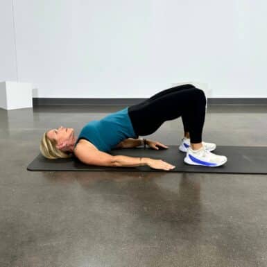 woman doing squat alternatives for bad knees bridge pose