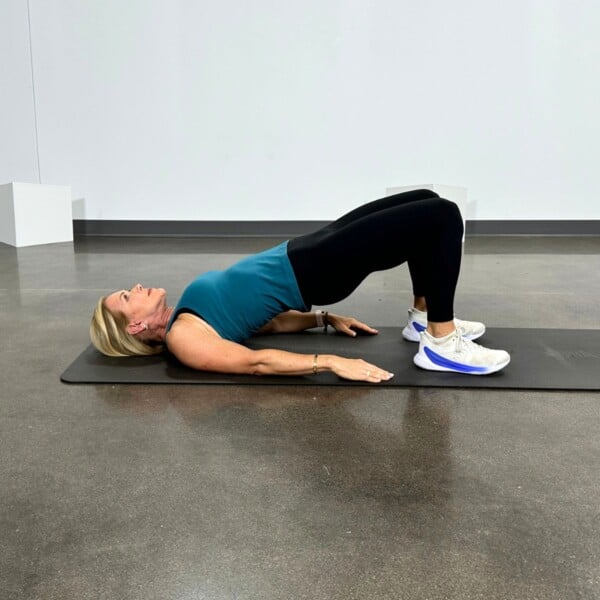 woman doing squat alternatives for bad knees bridge pose