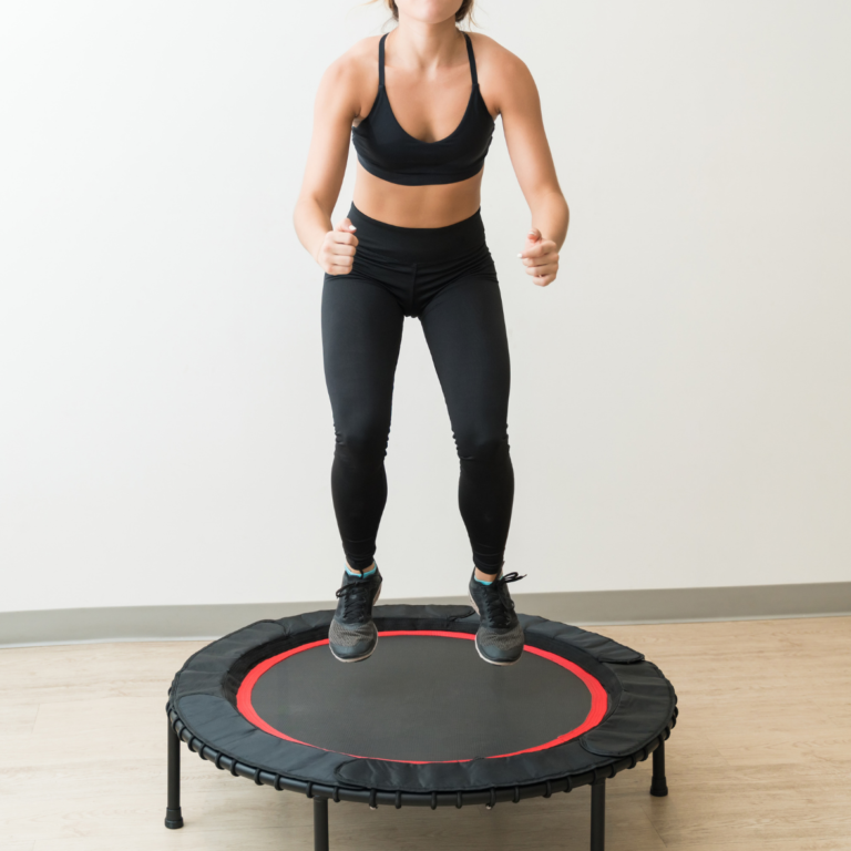 woman jumping connected  mini-trampoline