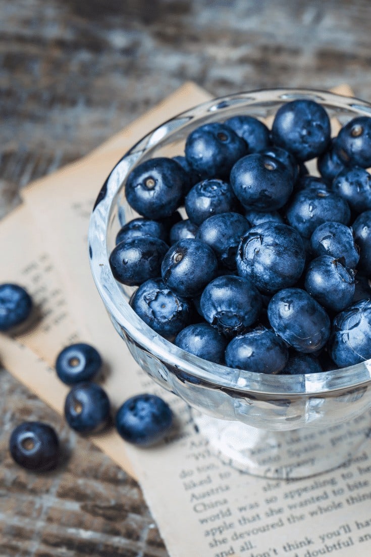 Glass bowl filled with blueberries