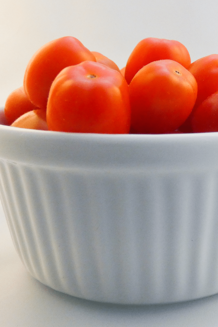 White bowl with cherry tomatoes