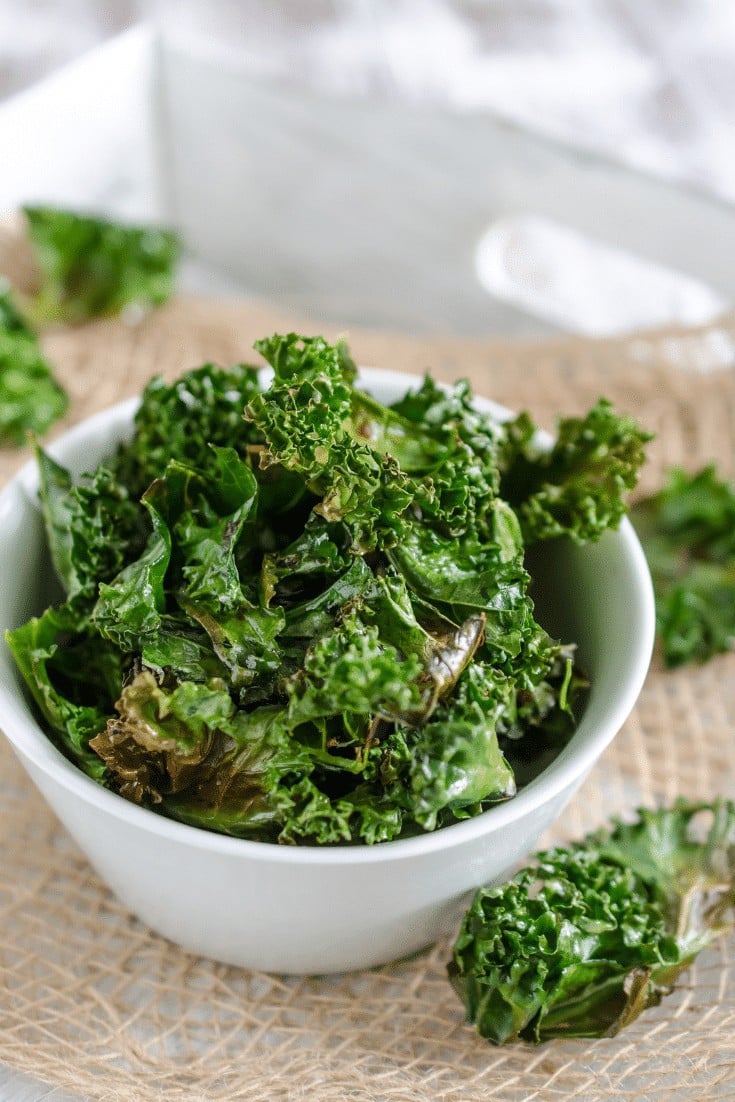 White bowl of kale chips