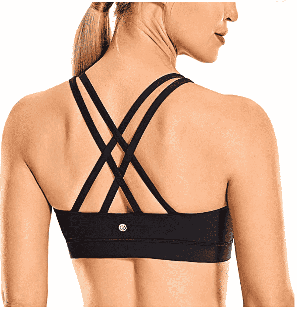 Woman wearing a strappy black sports bra.