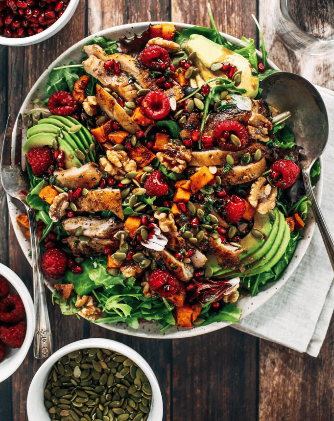 white bowl with colorful salad