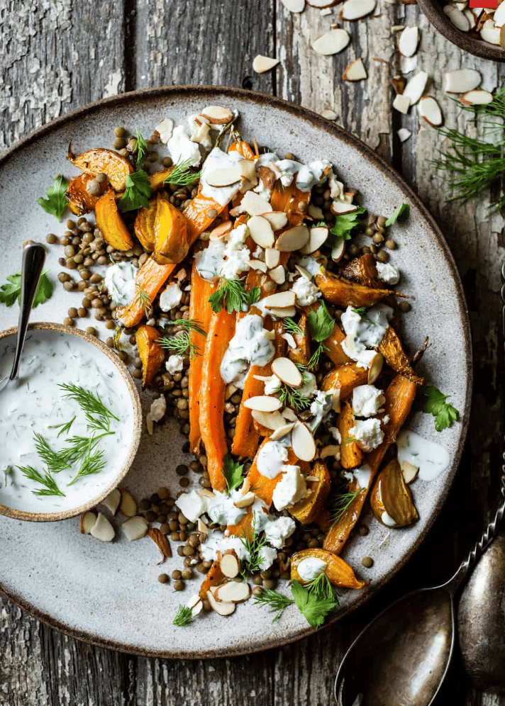 white organic plate with carrot and feta salad