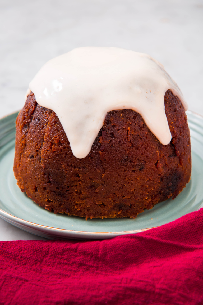 Individual gluten-free christmas pudding on plate
