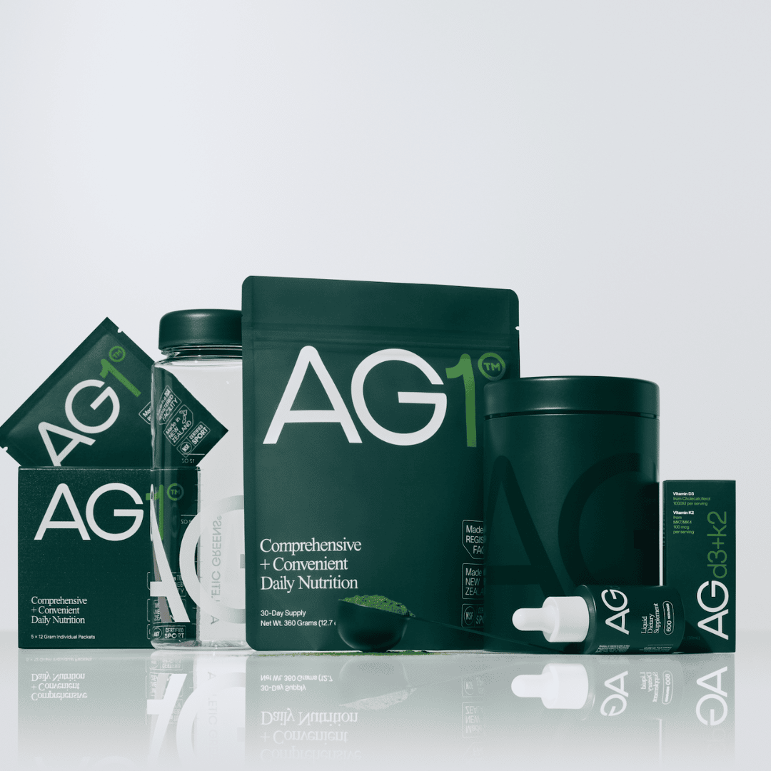 Athletic Greens packets - travel packets, canister, vitamin D3K2, and shaker bottle.