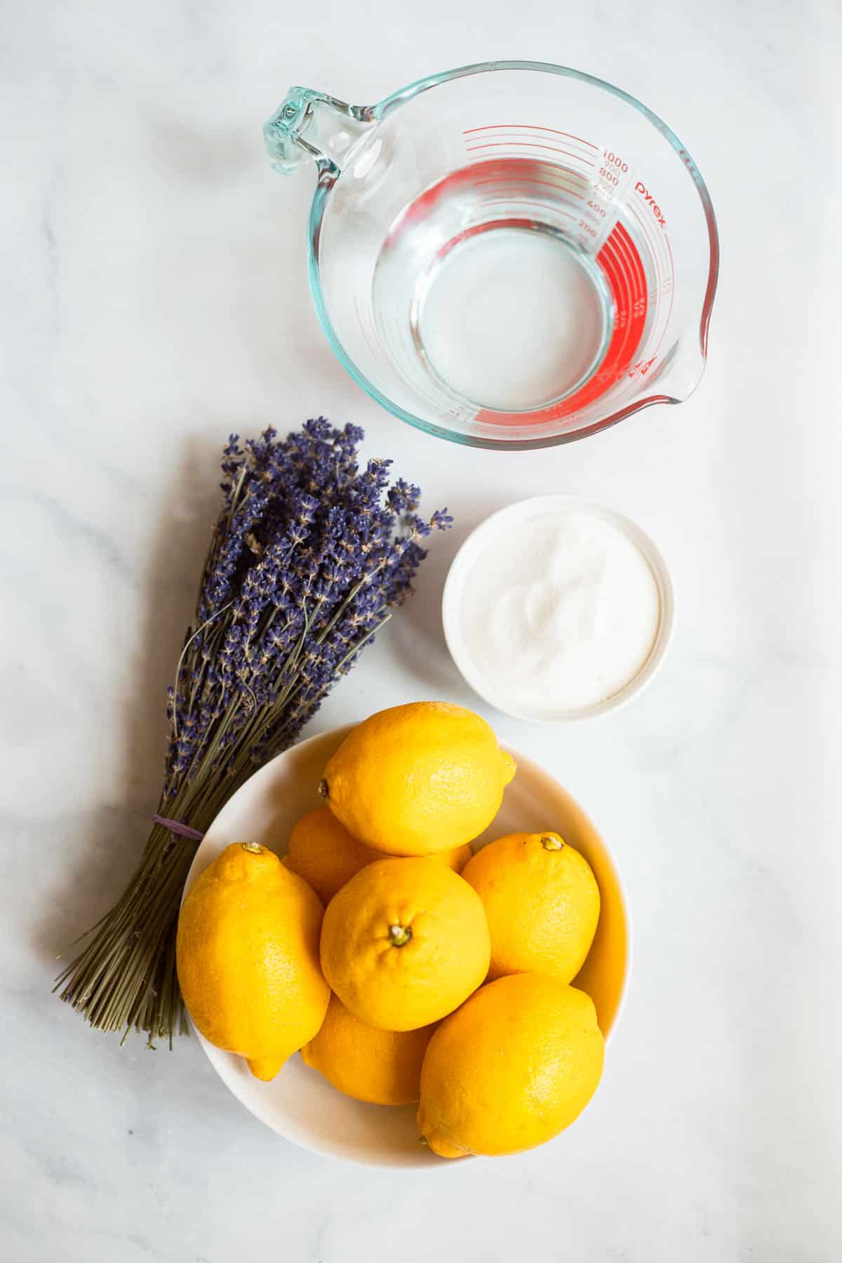 lavender lemonade ingredients laid out on a white background.
