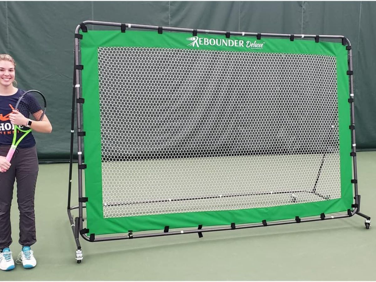 The oncourt offcourt pickleball rebounder net with a green trim.