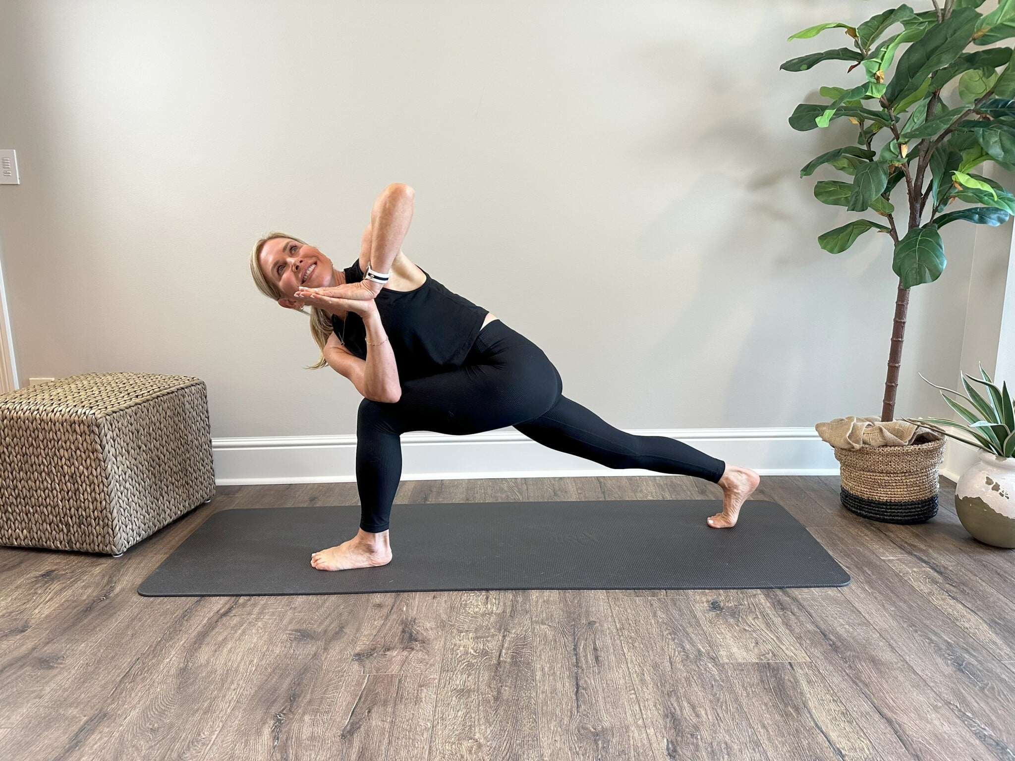 Chris Freytag demonstrating a yoga stretch for back pain.