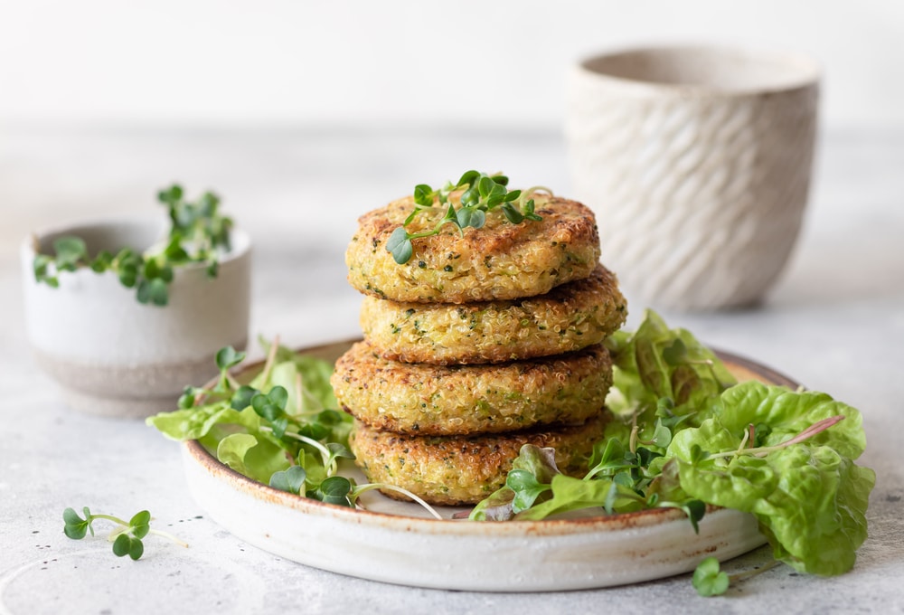 A stack of broccoli quinoa burgers.