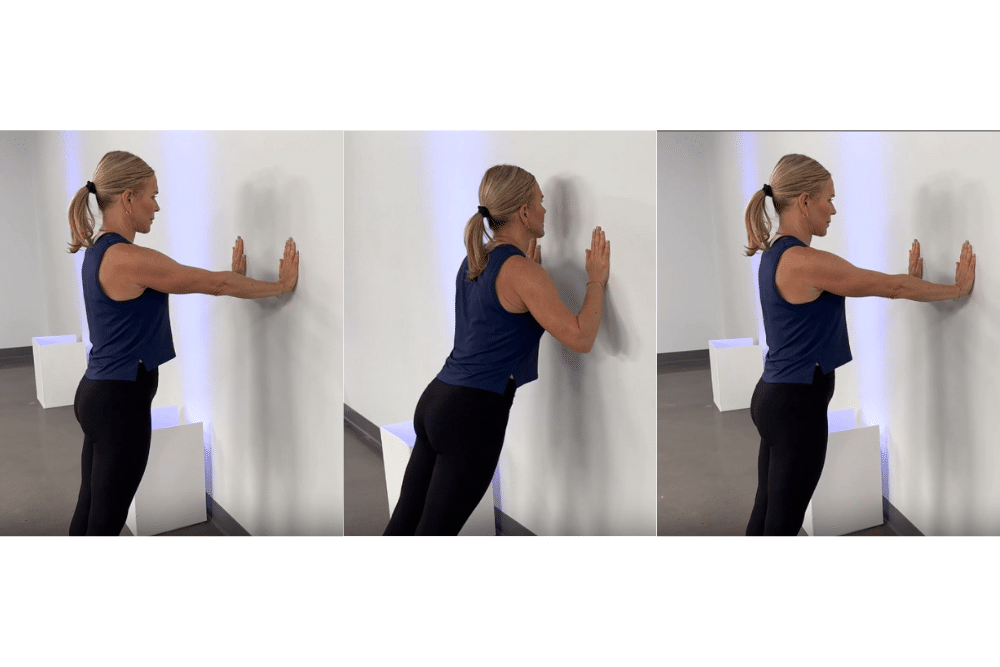 Chris Freytag demonstrating wall push-ups.