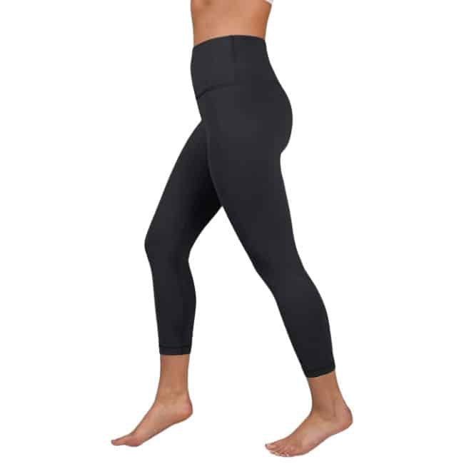 bottom half of woman wearing black cropped leggings