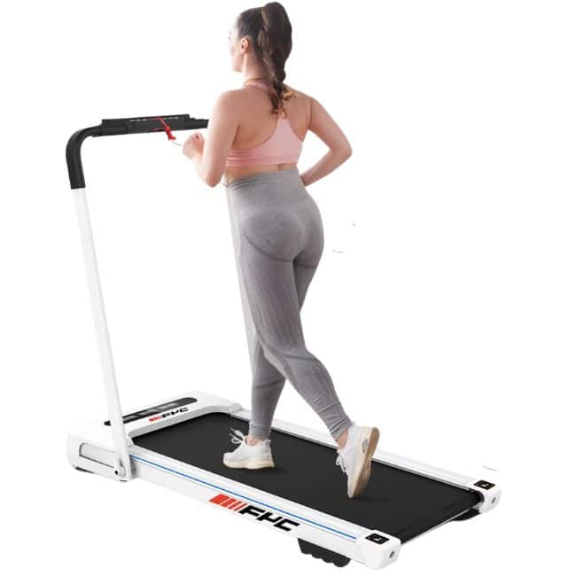 woman walking on walking pad with lifted handle bar
