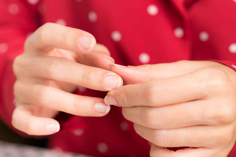 Close up of a woman's fingernails.