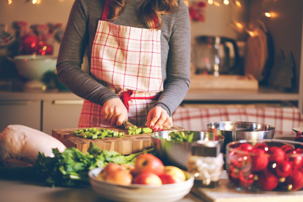 woman preparing healthy food over the holidays