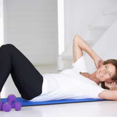 happy older woman doing exercises to prevent cellulite