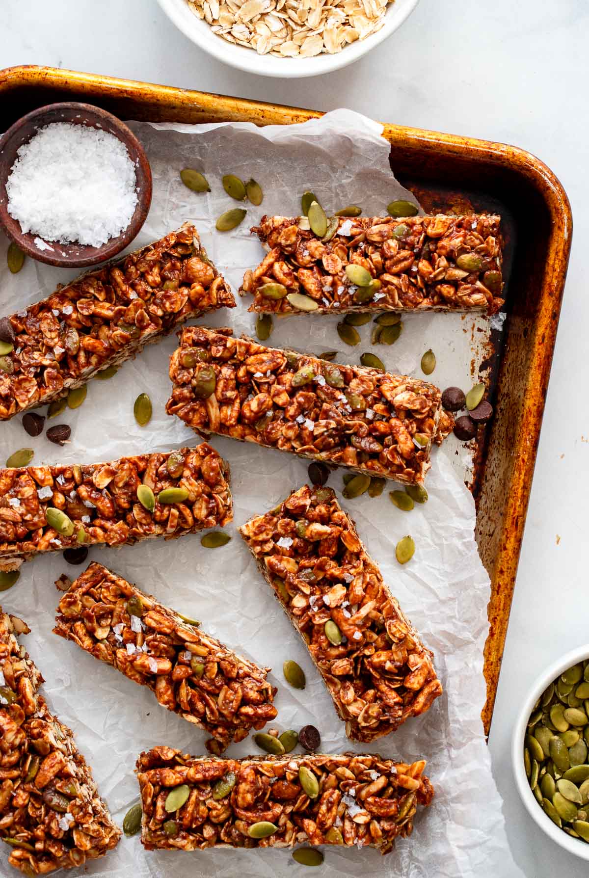 up close shot of healthy protein bars on cooking sheet with sea salt