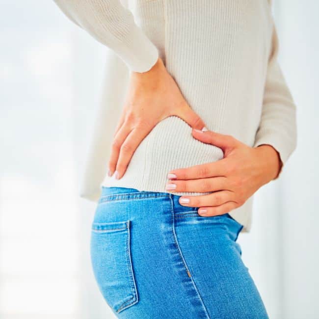 woman holding hip in pain additional hip bursitis pain treatments